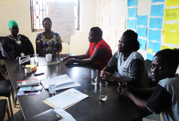 Members of the Women's Advocacy Network and the Justice and Reconciliation Project prepare to meet policy-makers to ensure that interim measures will be set up to address the issues war-affected women and their children face.