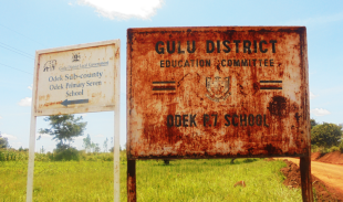 A sign for Odek Primary School in Gulu District.