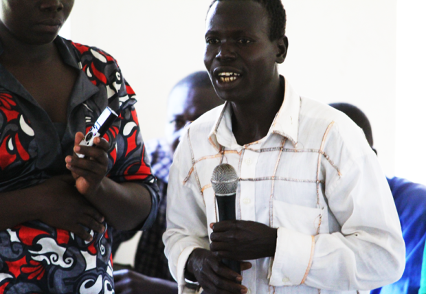 A man speaks during a community dialogue in Abia, Aleptong district as part of JRP's regional reconciliation project, 6 June 2015.
