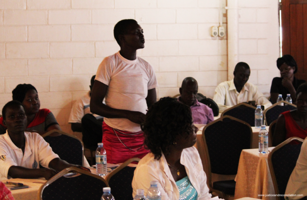 Judith Awari, the chairperson of Kuc Odwogo Women's Group in Agweng and a member of the Women's Advocacy Network, speaks during a consultative dialogue with stakeholders on conflict-related SGBV in northern Uganda in Lira, 8 September 2016. Oryem Nyeko/Justice and Reconciliation Project.